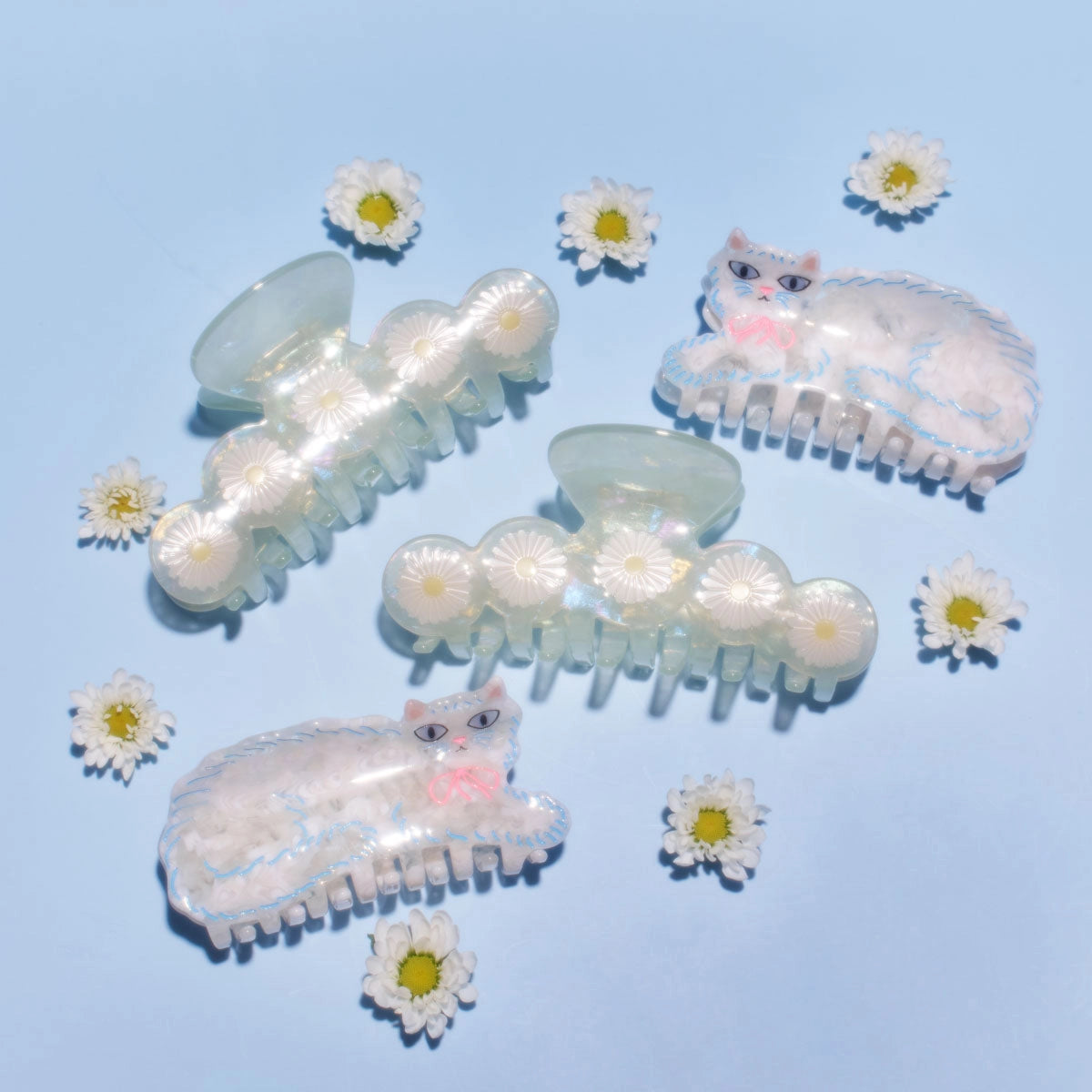White Persian Cat Hair Claw with Pink Bow · Winona Irene