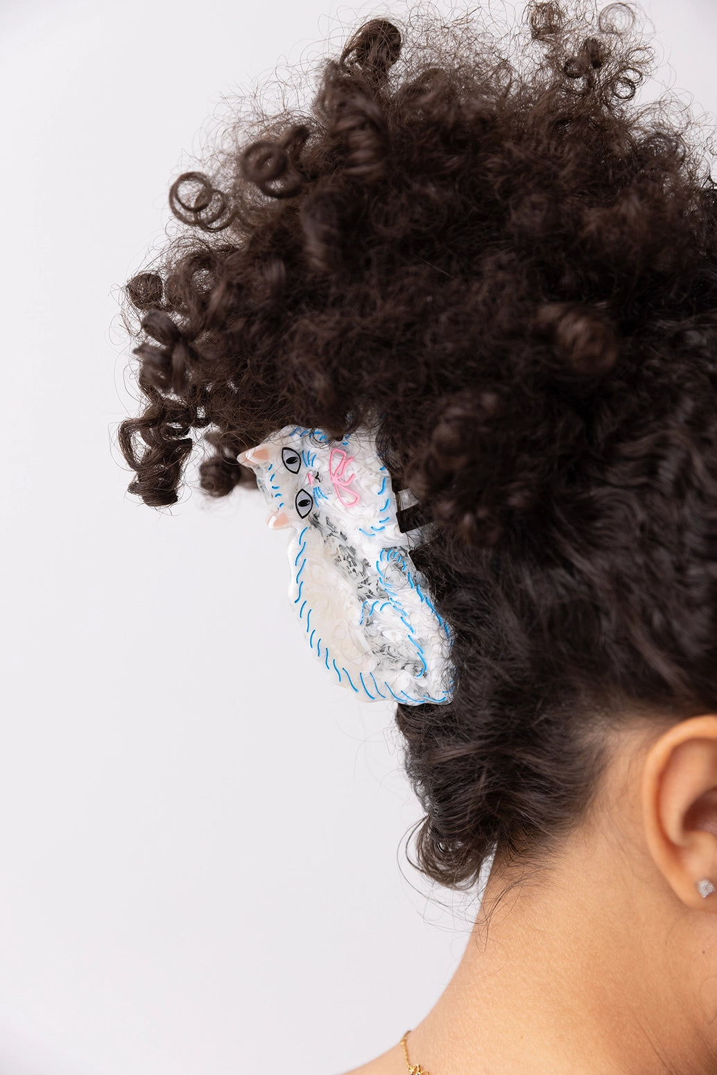 White Persian Cat Hair Claw with Pink Bow · Winona Irene