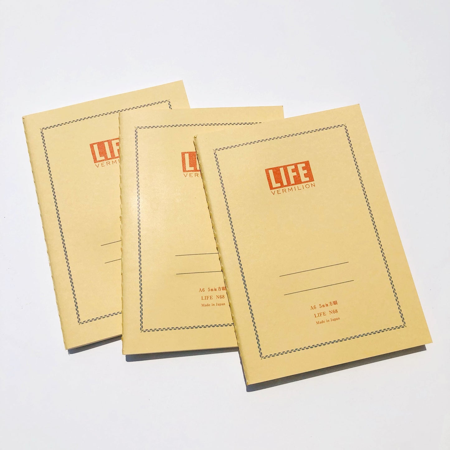 Vermillion Grid A6 Notebook · Life