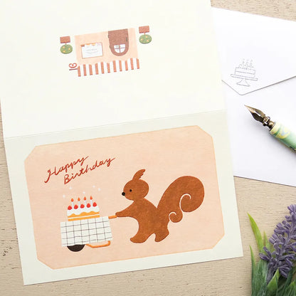 Squirrel Cake Shop Birthday Card | Mariko Fukuoka · Cozyca