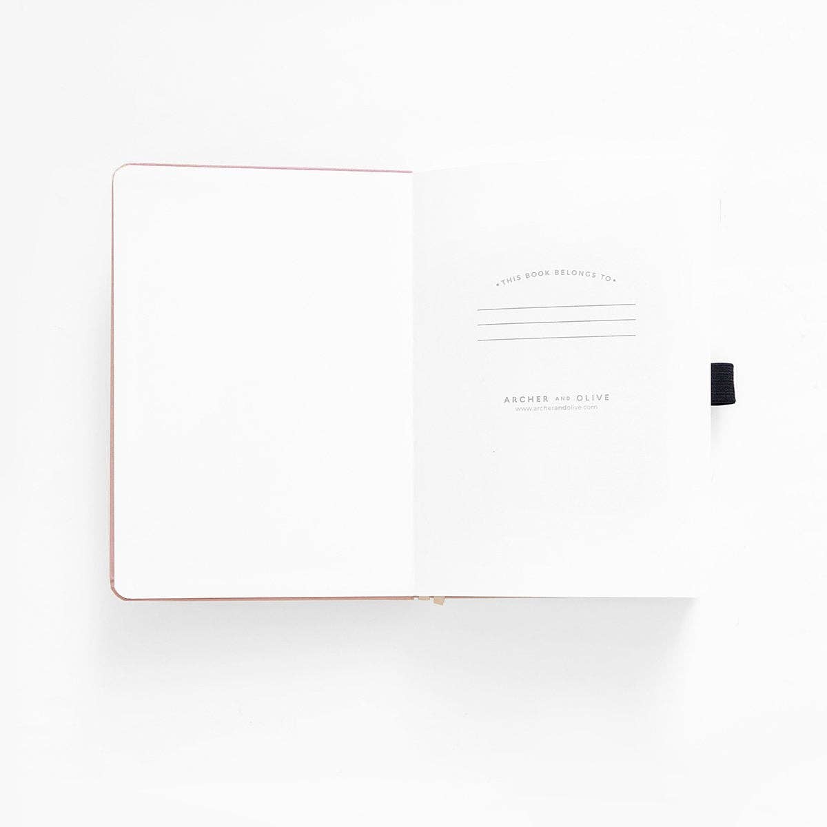 Storybook in Plum A5 Dot Grid Notebook · Archer & Olive