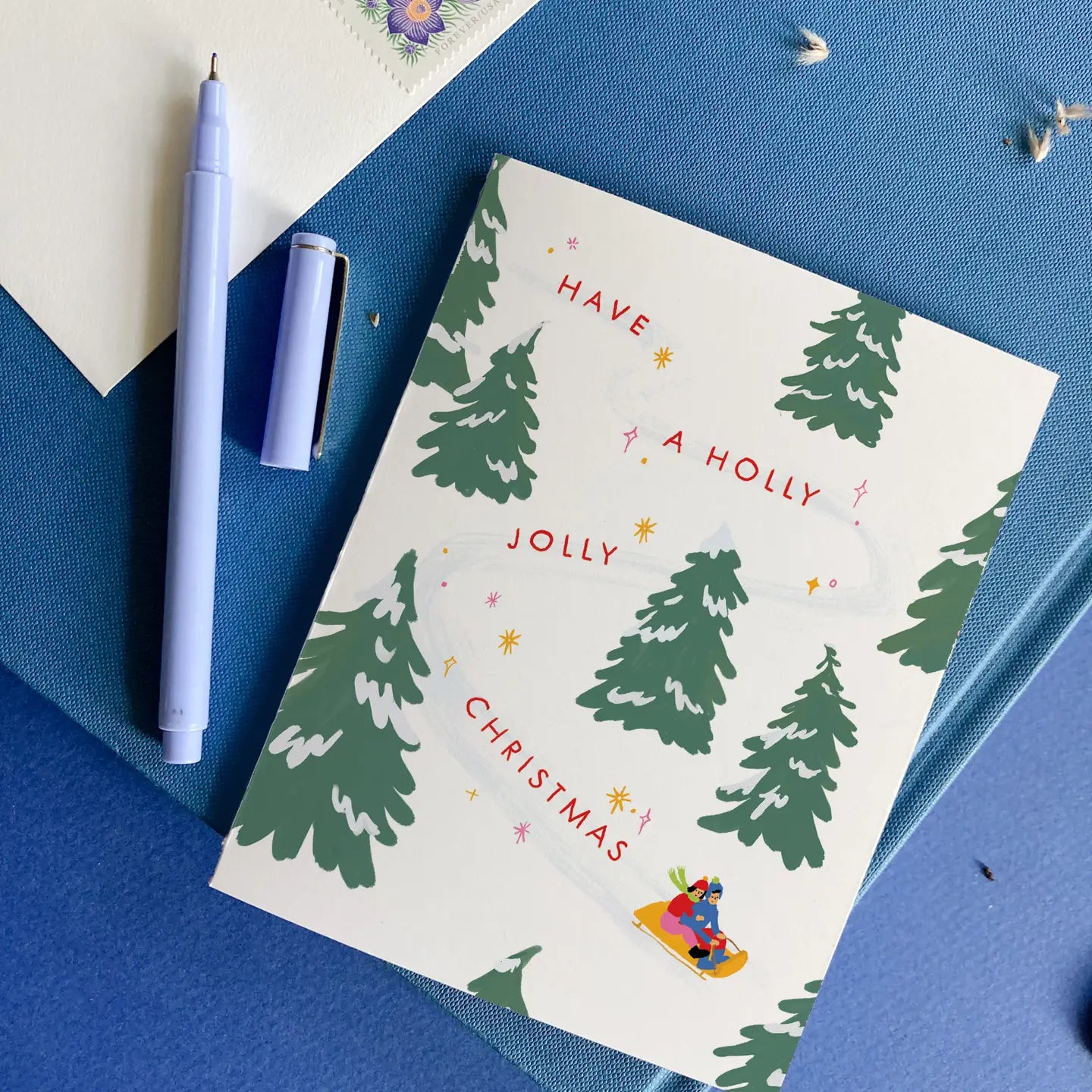 Jolly Sledding Classic Christmas Tree  Holiday Card · Karen Schipper