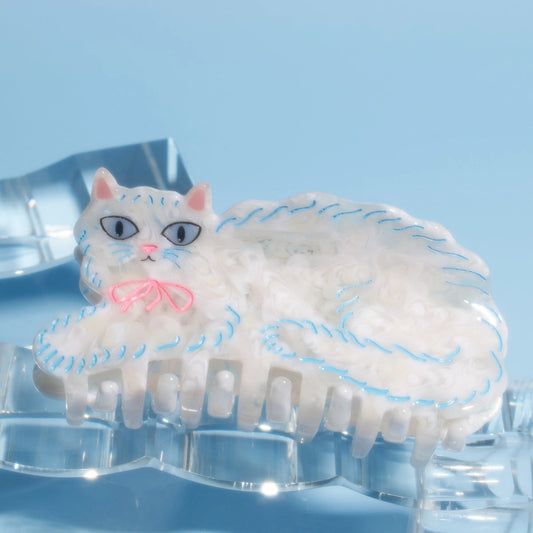 White Persian Cat Hair Claw with Pink Bow · Winona Irene